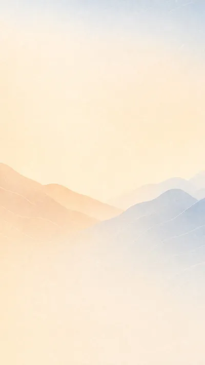 Peach and blue hills under a warm sky